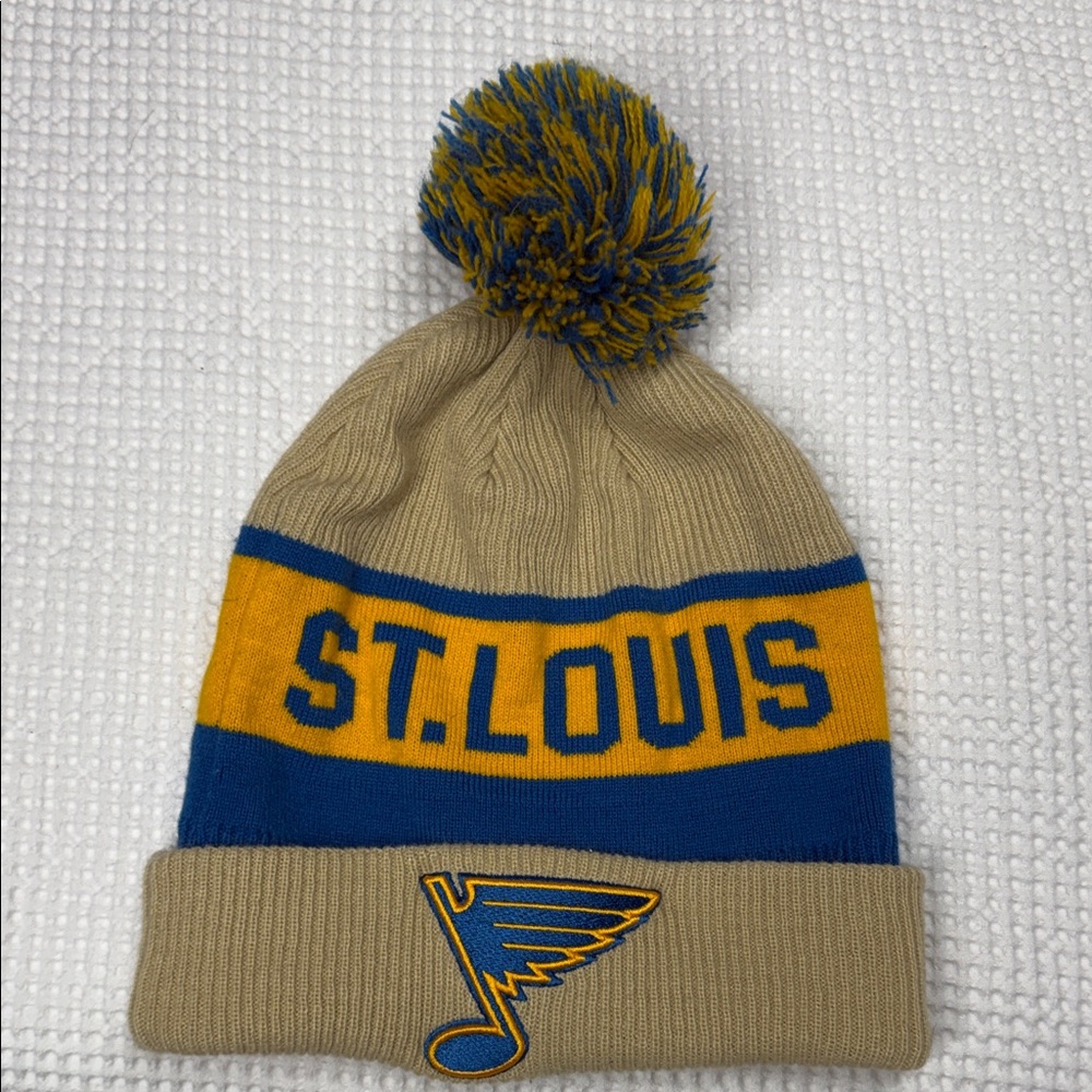 Fanatics- St. Louis Knit Pom Beanie with Blues Logo - Tan, Blue, Gold